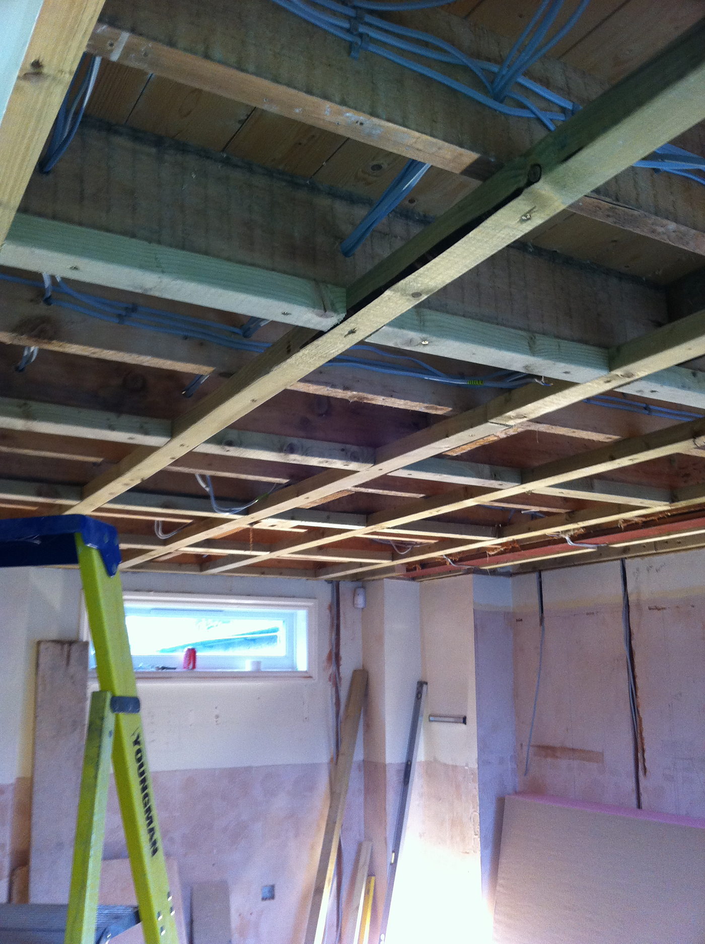 First fix cabling run through the ceiling joists of a kitchen